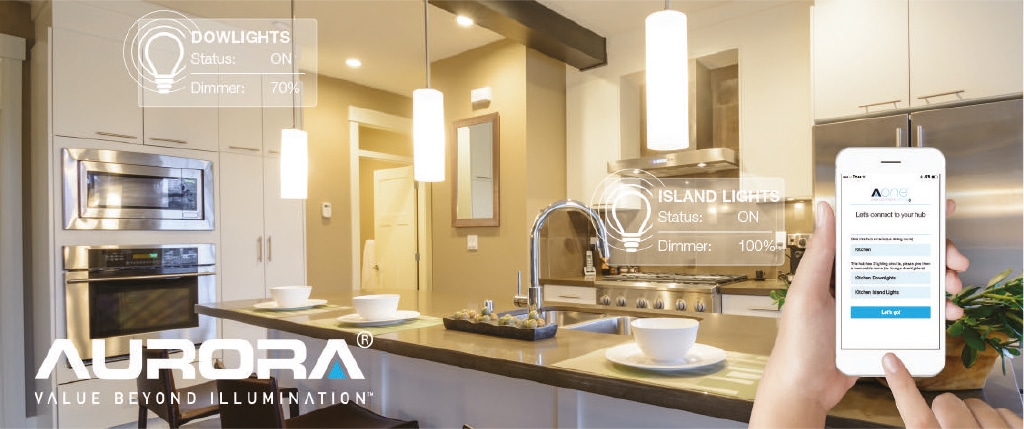 Image of a kitchen and a hand holding a phone in the foreground where the AOne app is on