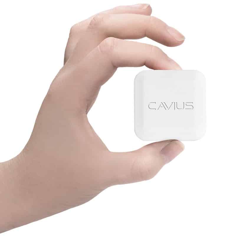 Image of a hand holding the Cavius smart alarm hub
